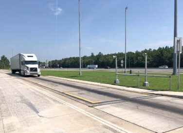 truck entering motor carrier on the road